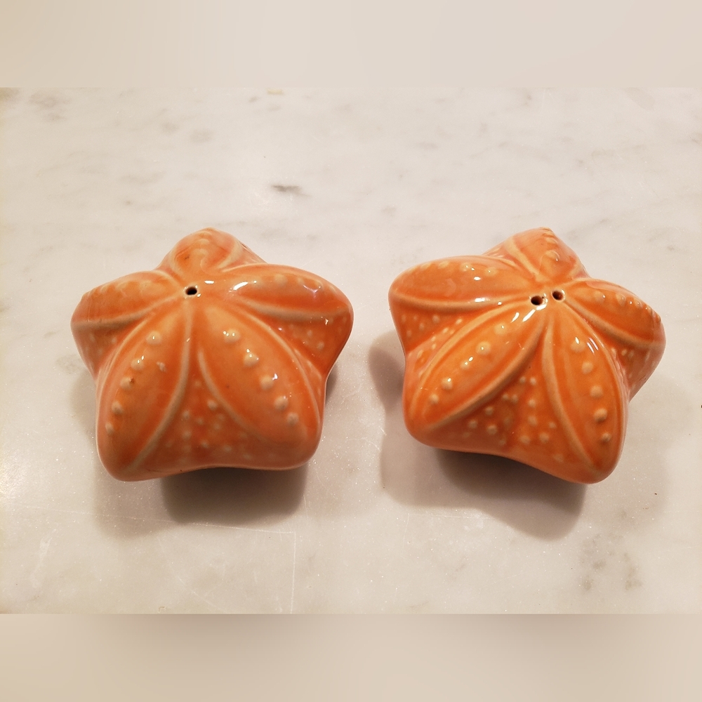 Primitive Artisan Orange Sand Dollar Style Ceramic Salt And Pepper Shakers